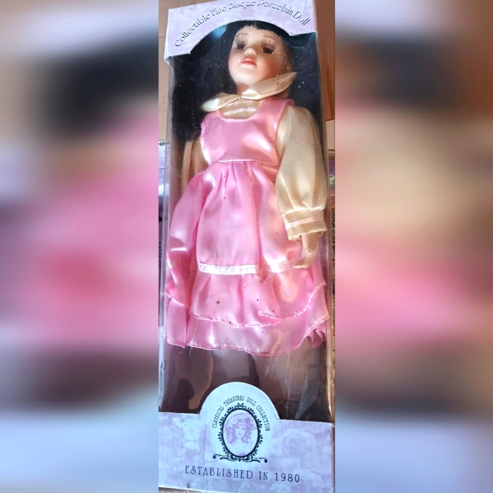 NEW BOXED COLLECTIBLE PINK PORCELAIN DOLLStart or add it to your DOLL collec